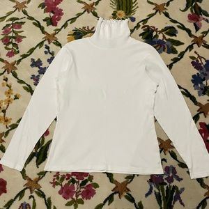 Womens long sleeve turtleneck size M in white. Ruffle around top of neck.